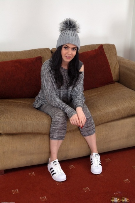 Amateur dark haired teen Lou Lou gets naked & rubs her fuzzy pussy