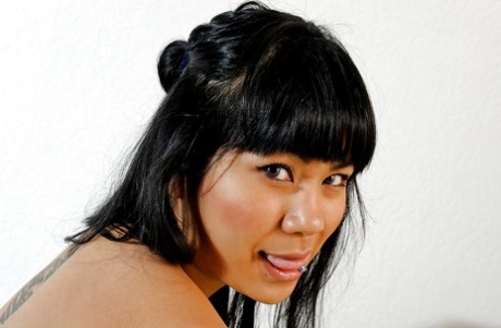 Sexy mixed race chick Kyanna parting trimmed cunt for clitoris exposure