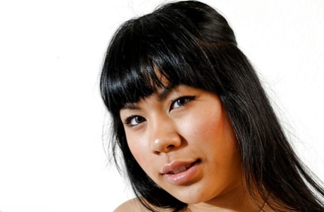 Sexy mixed race chick Kyanna parting trimmed cunt for clitoris exposure