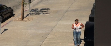 Oblivious busty Karmen Jay's big tits captured in downblouse voyeur photos