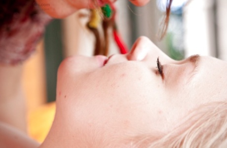 Naughty girls Fleur D and Jade S tongue kissing and tribbing outdoors