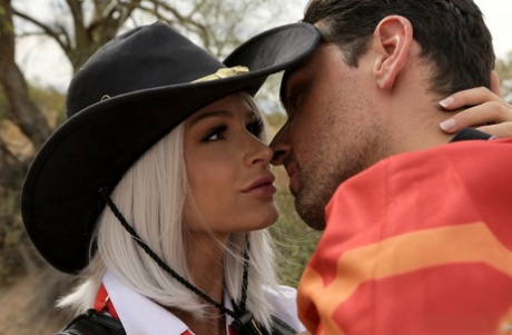 Thin girl Emma Hix licks jizz from a finger after cosplay sex on scrub land