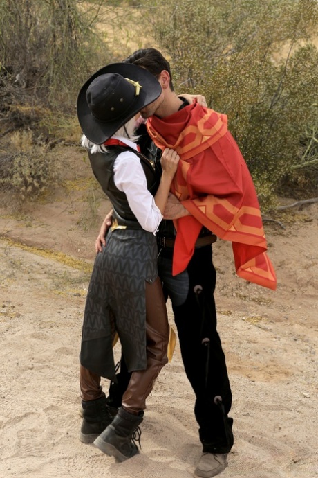 Thin girl Emma Hix licks jizz from a finger after cosplay sex on scrub land