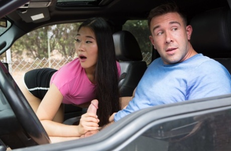 Asian female in black shorts sucks a cock after getting in a vehicle
