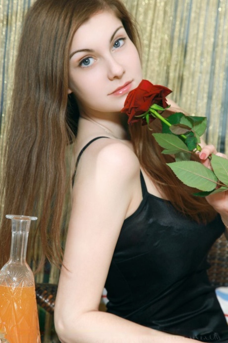 Glamourous Euro teen Marta E revealing full all natural teen breasts