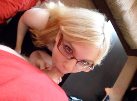 Nerdy amateur Jessica Lo sucks off a dick on her knees for cumshot on glasses