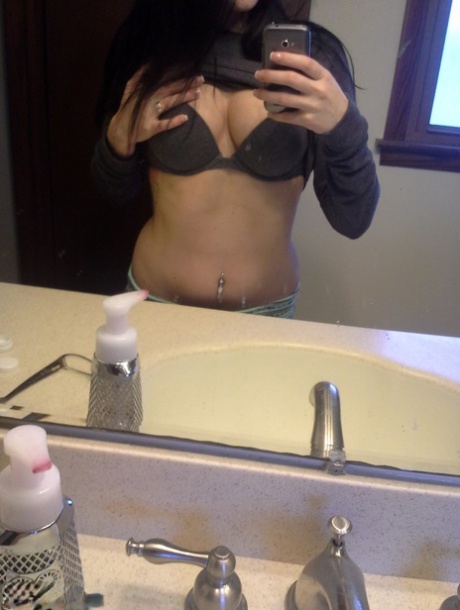 Stacked brunette cutie Freckles 18 takes pictures of her naked body