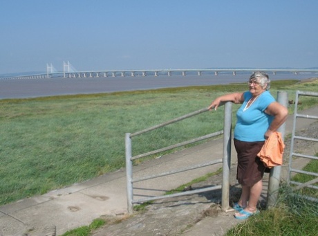 Fat old woman Grandma Libby exposes herself on a desolate bike path