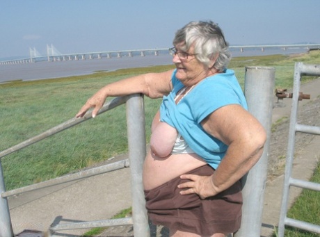 Fat old woman Grandma Libby exposes herself on a desolate bike path