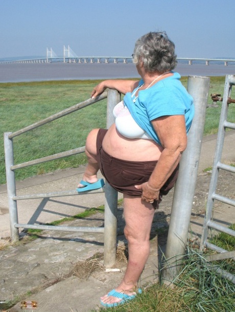 Fat old woman Grandma Libby exposes herself on a desolate bike path