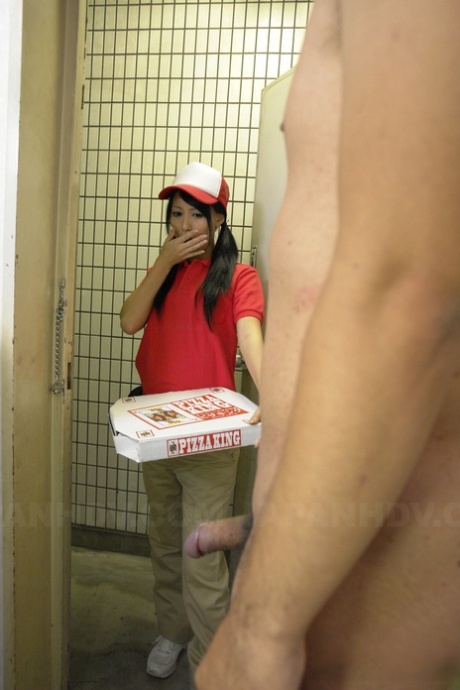 Japanese pizza delivery girl Miku Oguri is greeted at door by a hard cock