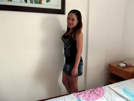 Happy little Asian Anna Marie strips to show off nice firm breasts & spread