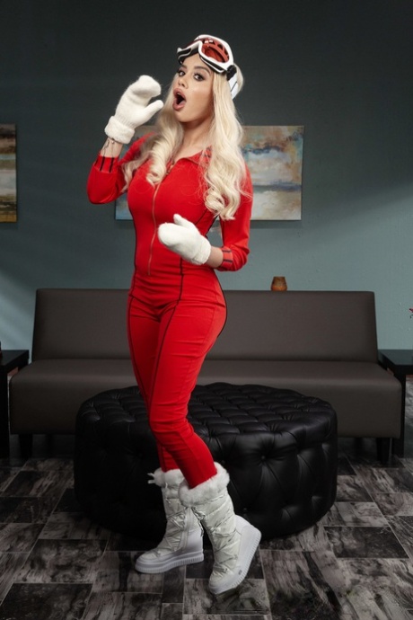 Busty blonde babe Victoria June doffs her red uniform and takes a dick