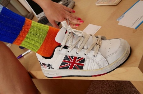 Solo girl Dasha gets naked in multi-colored knee socks and sneakers