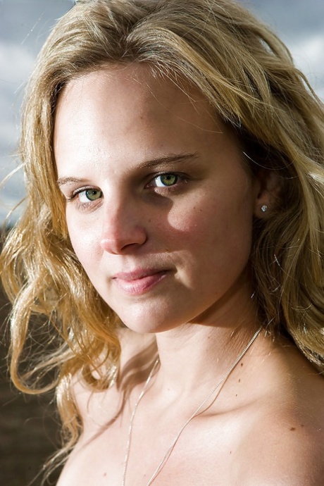 Blonde amateur Kristal heads outdoors to bare her naked MILF body