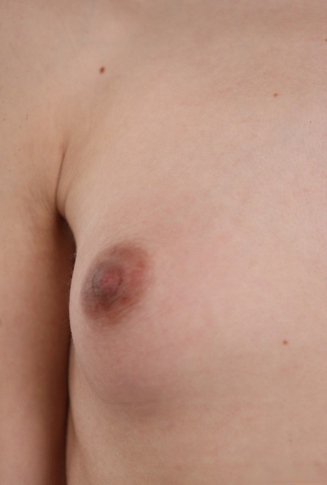 Skinny 18 year old virgin Natalia takes off her clothes to stand in the nude