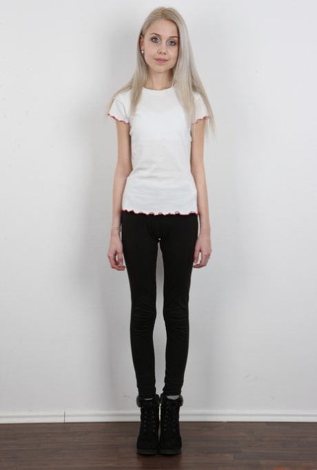 Skinny 18 year old virgin Natalia takes off her clothes to stand in the nude