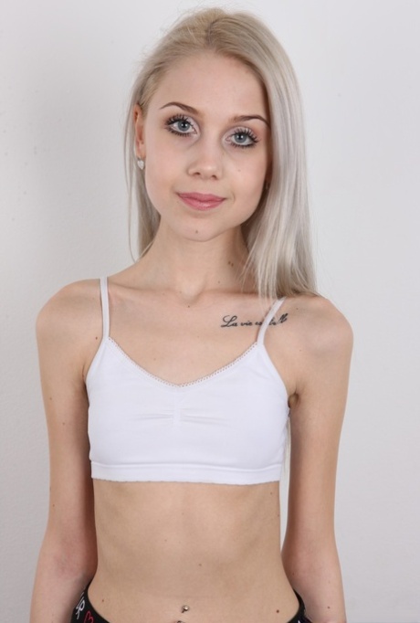 Skinny 18 year old virgin Natalia takes off her clothes to stand in the nude