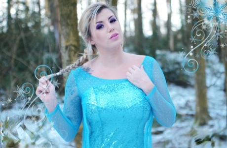 Yuffie Yulan cosplays Elsa from Frozen while displaying her big tits outdoors