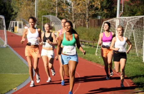 Girls running team show enjoy a hot lesbian pussy licking after game shower