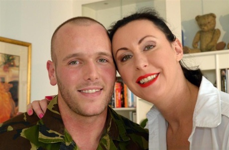 Tall lady wears a ball gag and schoolgirl clothes during anal sex