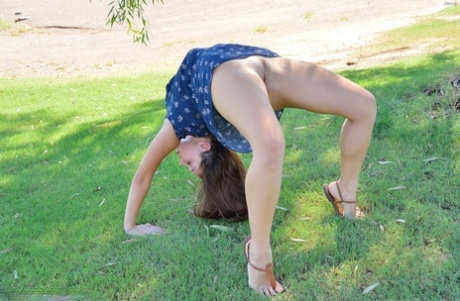 Summer dress and sandals attired teen cutie flashing meaty cunt lips