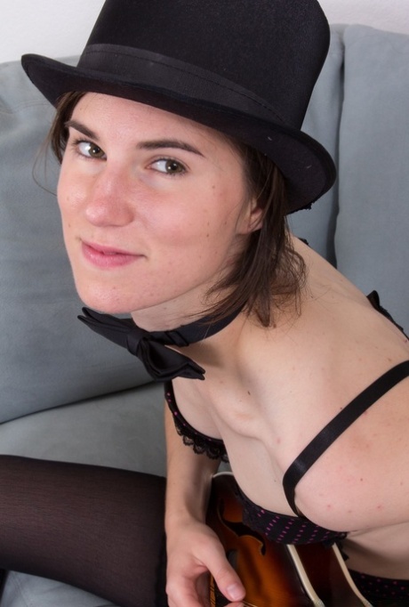 Burlesque dancer Kiyoko shows her hairy pussy after a top hat performance