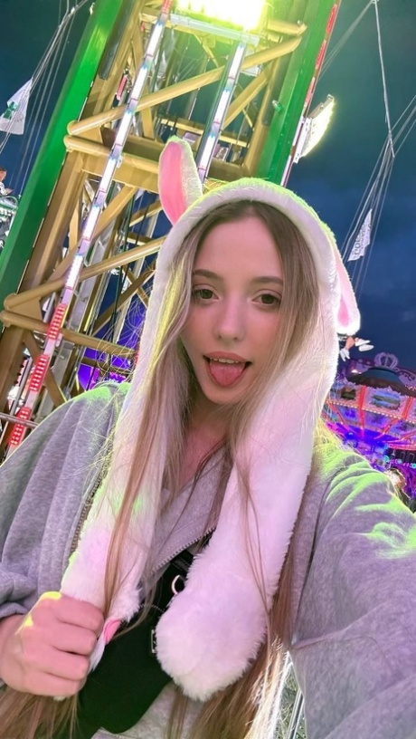 Charming blonde teen Katya Sun takes numerous self shots in SFW mode