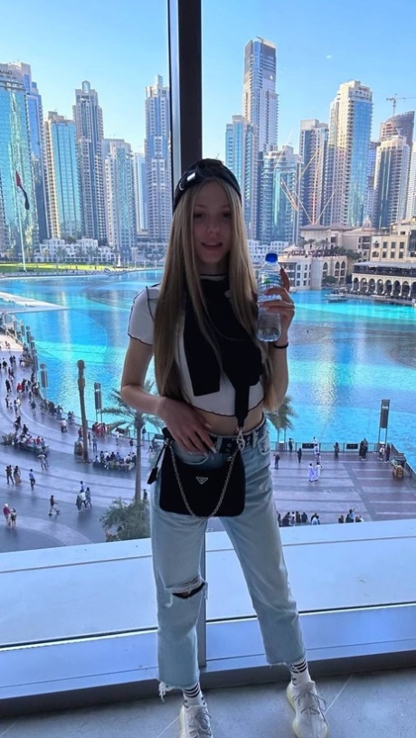 Charming blonde teen Katya Sun takes numerous self shots in SFW mode