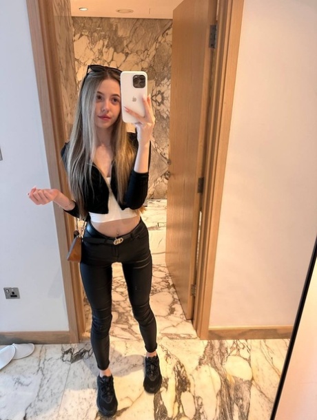 Charming blonde teen Katya Sun takes numerous self shots in SFW mode