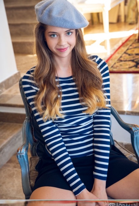 Charming teen Kay J flashes her polkadot underwear before getting bare naked