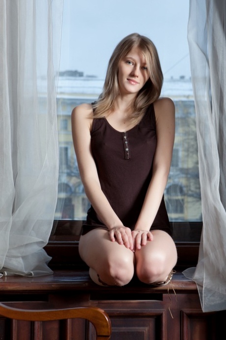 Sexy babe Mila I undressing and posing butt naked in the bathroom