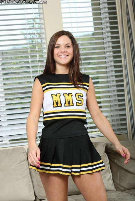 Sexy Latina cheerleader Elizabeth Anne loses her panties & spreads her pussy