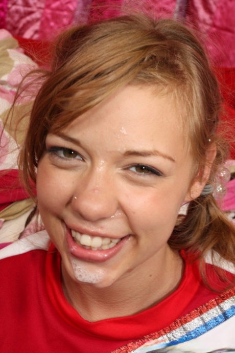 Young cheerleader Nicole Ray sucks the sperm out of huge cock