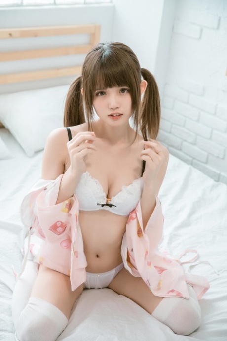 Barely legal Asian teen flaunting her gorgeous body in her cute lingerie