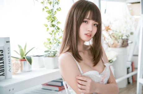 Barely legal Asian teen flaunting her gorgeous body in her cute lingerie