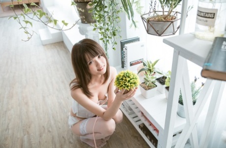 Barely legal Asian teen flaunting her gorgeous body in her cute lingerie