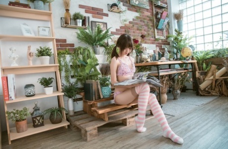 Barely legal Asian teen flaunting her gorgeous body in her cute lingerie