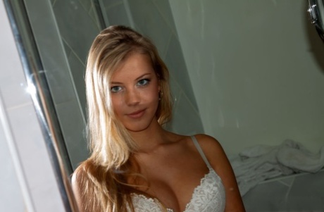 Barely legal blonde Barbara D uncups her perky boobs in yoga pants