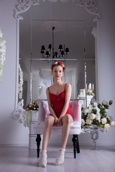 Innocent teen babe Alisabelle strips to her socks and spreads her pussy