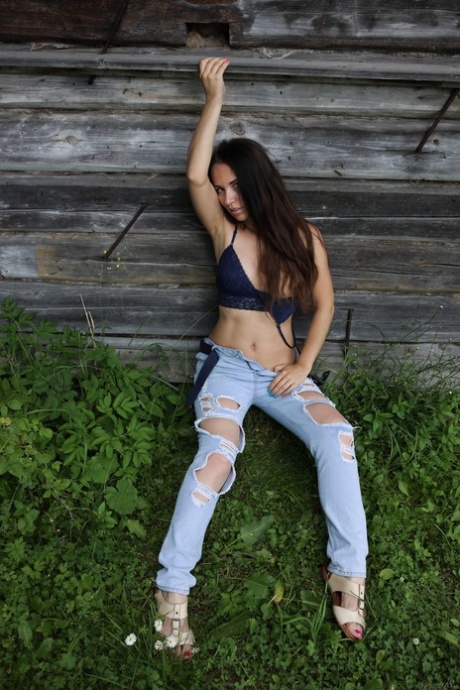 Beautiful babe Nicole V flaunts her big ass in a sexy outdoor striptease