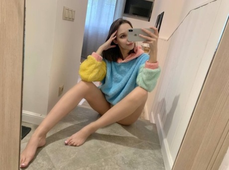 Blue-eyed OnlyFans model Little Kitty shows her perky tits & round ass