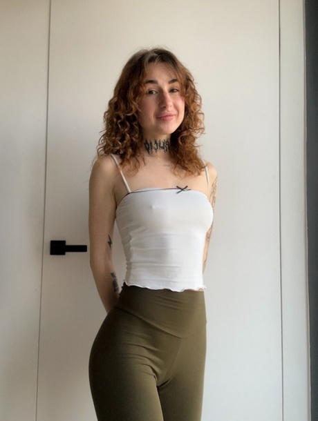 Solo girl Curly Polly gets totally naked while changing her outfits