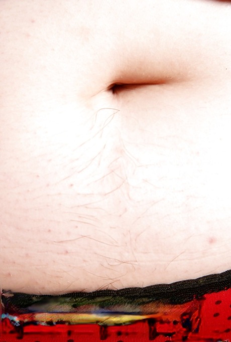 Mature BBW in high heels shows off big butt and hairy vagina