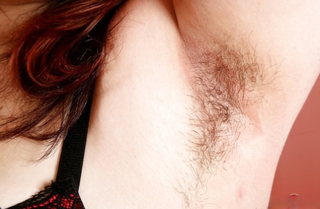 Mature BBW in high heels shows off big butt and hairy vagina