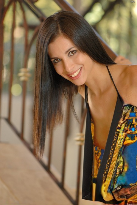 Skinny beauty Tera unveils her cunt and stuffs it with her fist