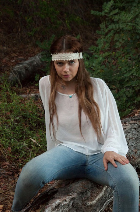 Amateur teen Marina Visconti shows off her big juggs and poses outdoors