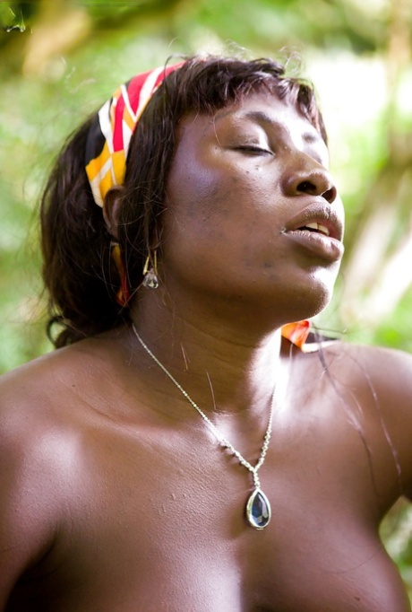 Older black woman Lewa getting naked in woods for nude modeling debut