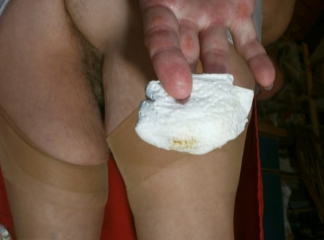 Horny oma Caro pleasures her pussy with a wooden spoon and a cucumber