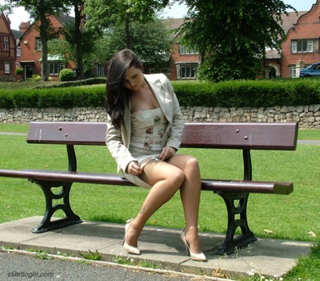 Outdoor posing from a beautiful non nude model in high heels Donna